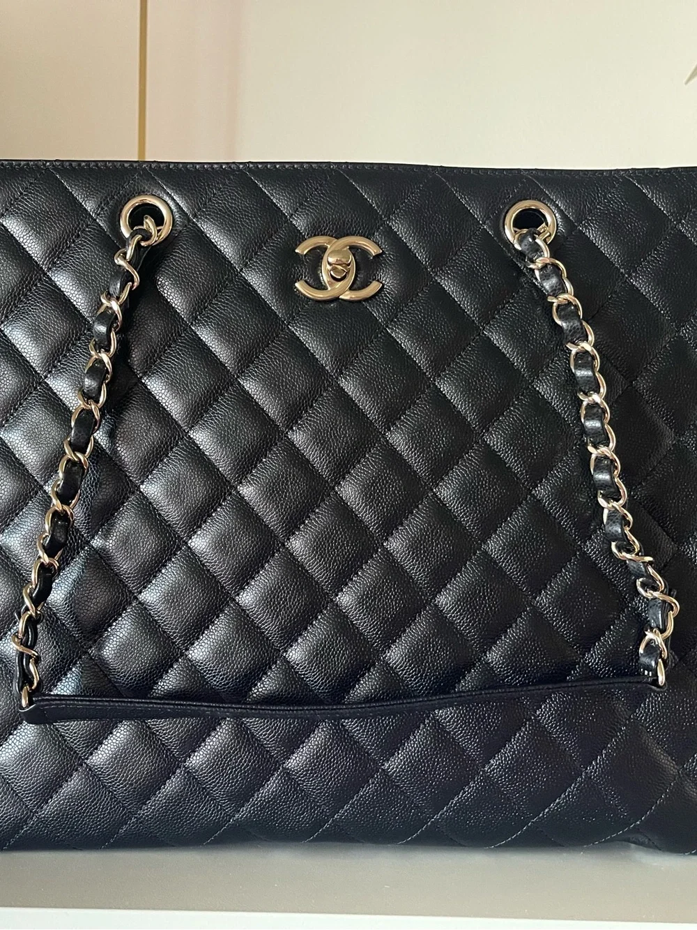 CHANEL Black Quilted Leather Tote with Gold-Tone CC